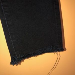 Black high-rise frayed skinny jeans